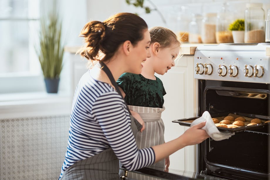 Mother and daughter baking