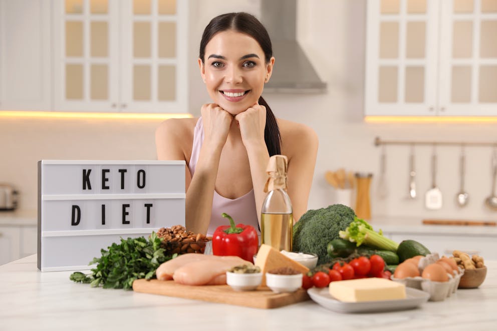 Woman with ketogenic foods