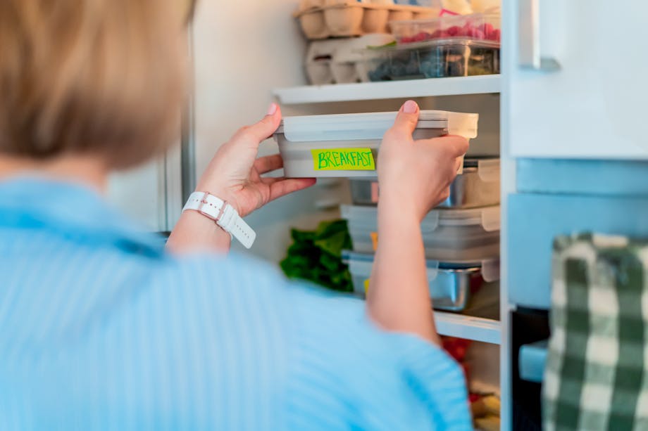 Placing food in the fridge