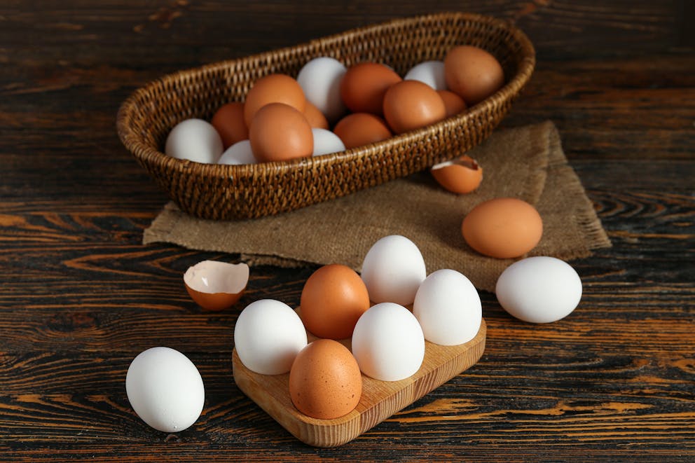 White and brown colored eggs