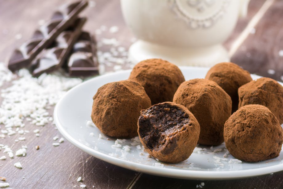 Chocolate bombs on a white plate