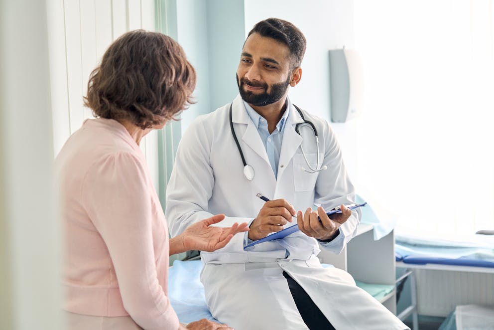 Patient talking to doctor