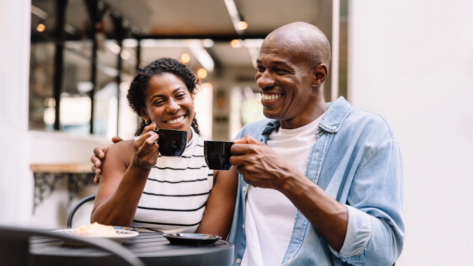 Happy couple drinking coffee