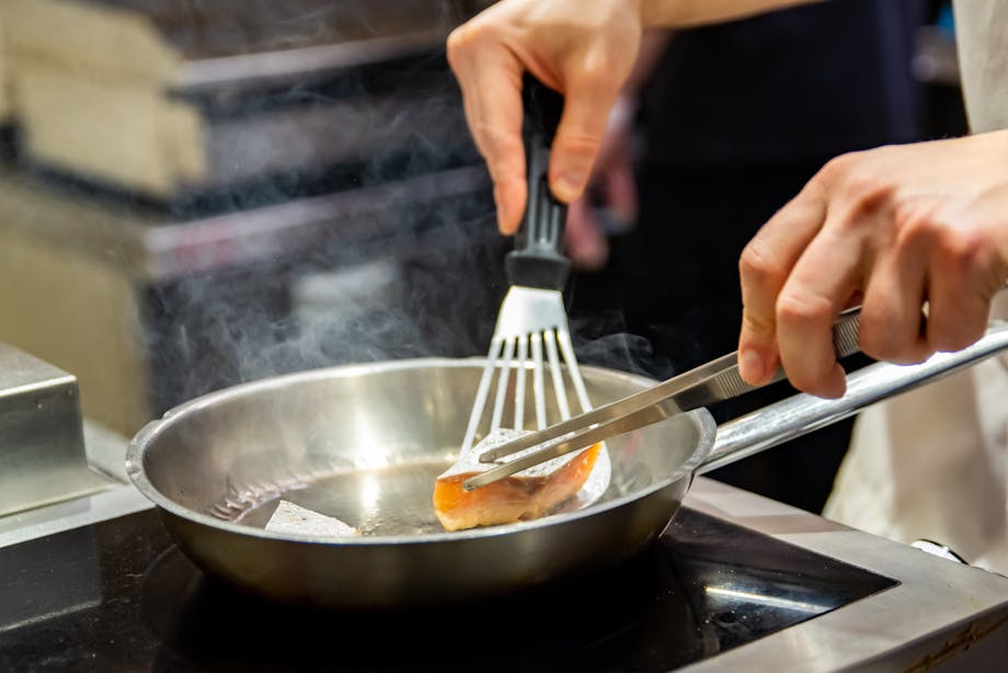 Cooking salmon fillet in the pan