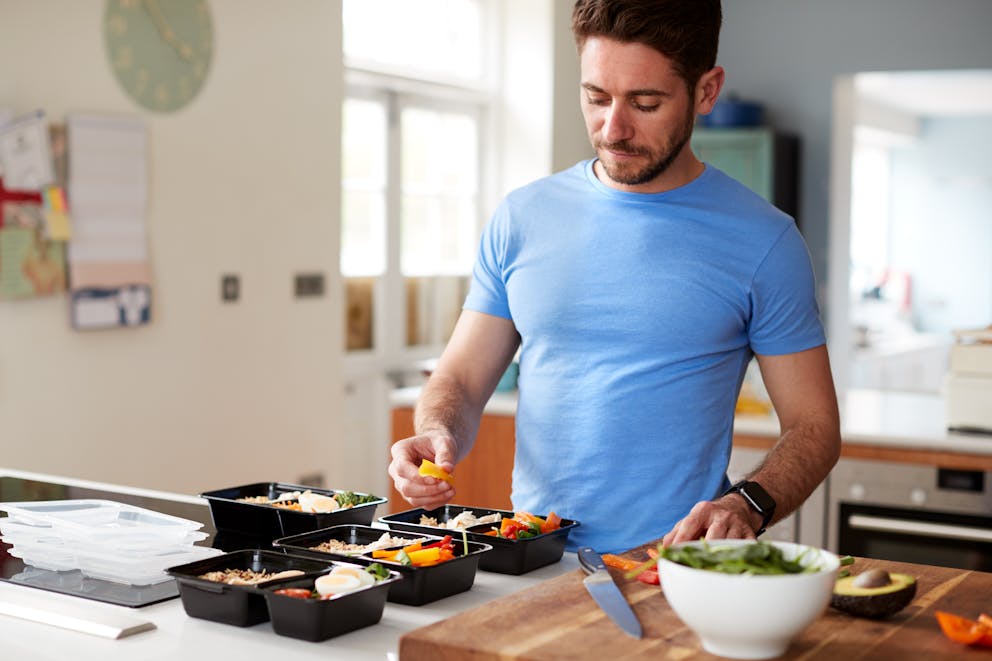 Man prepping meals