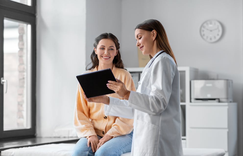 Woman consulting with her doctor