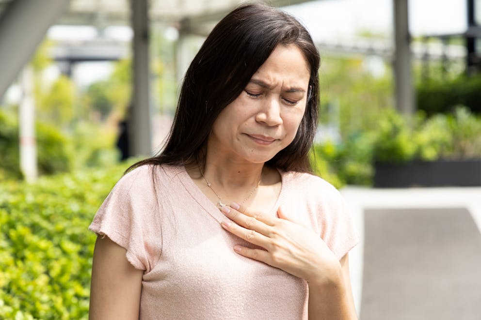 woman having acid reflux