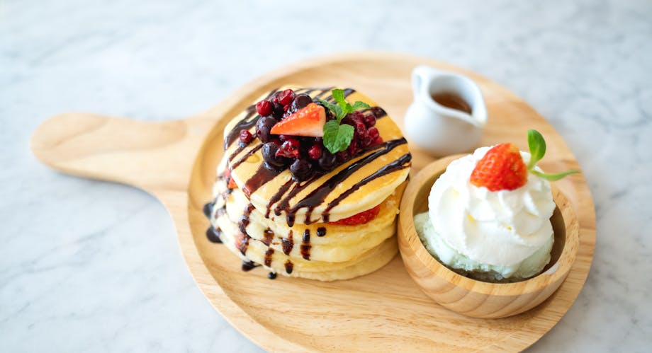 Berry pancake with whipped cream