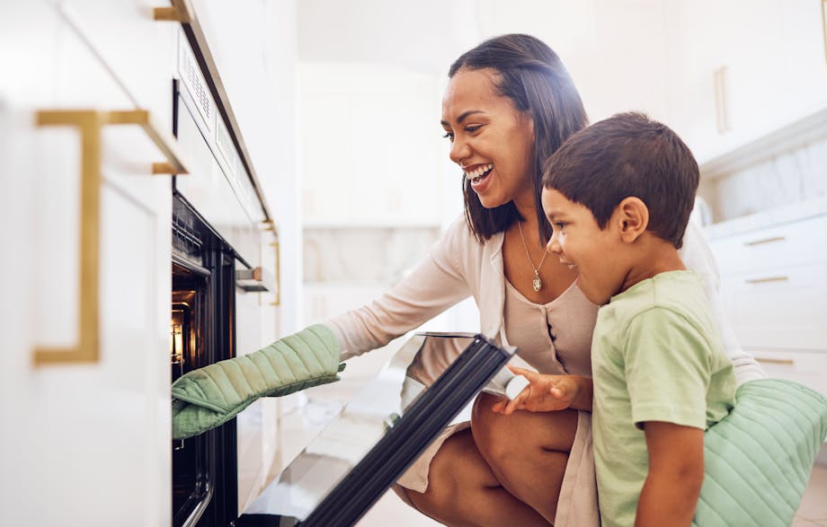 Mother and child baking