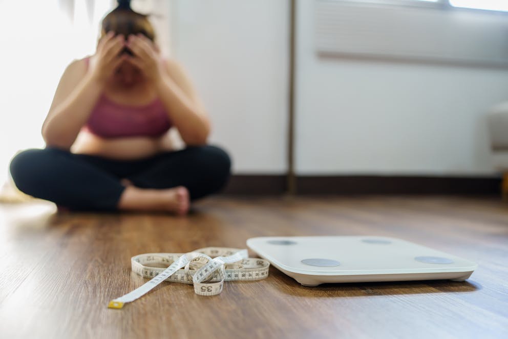 Frustrated woman on the floor