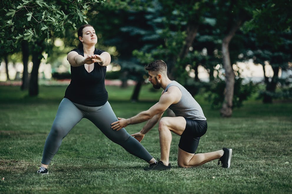 Overweight women and personal trainer