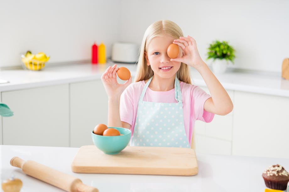 Girl holding eggs