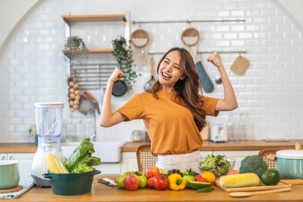 Happy woman in the kitchen