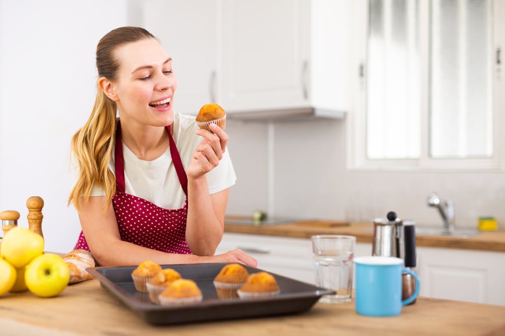 Woman holding a muffin