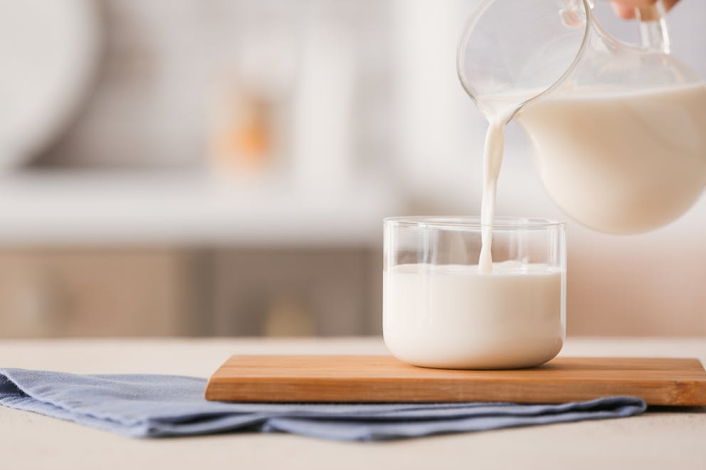 Pouring milk into a glass