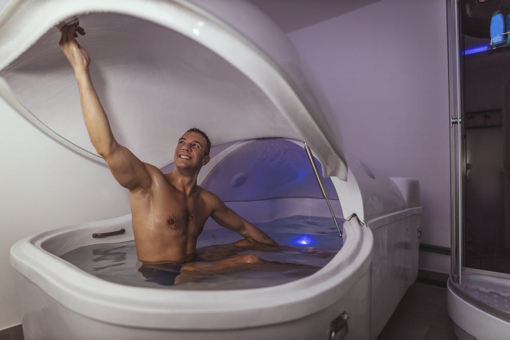 man entering a float tank