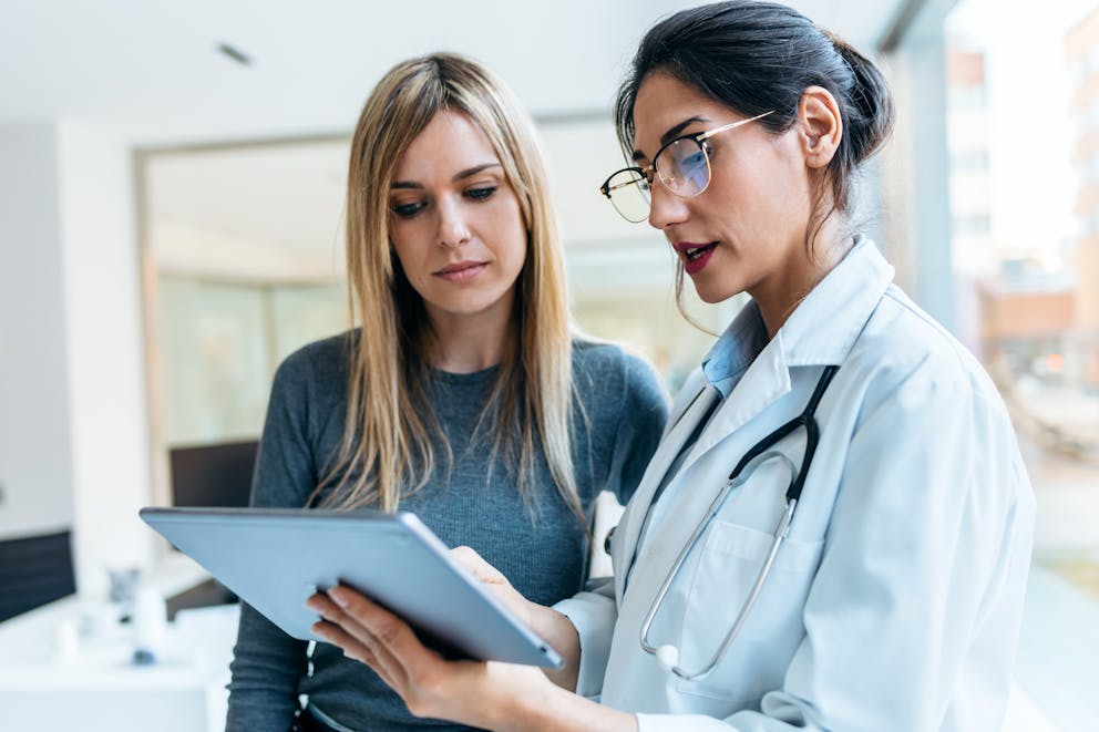 Woman talking to a doctor