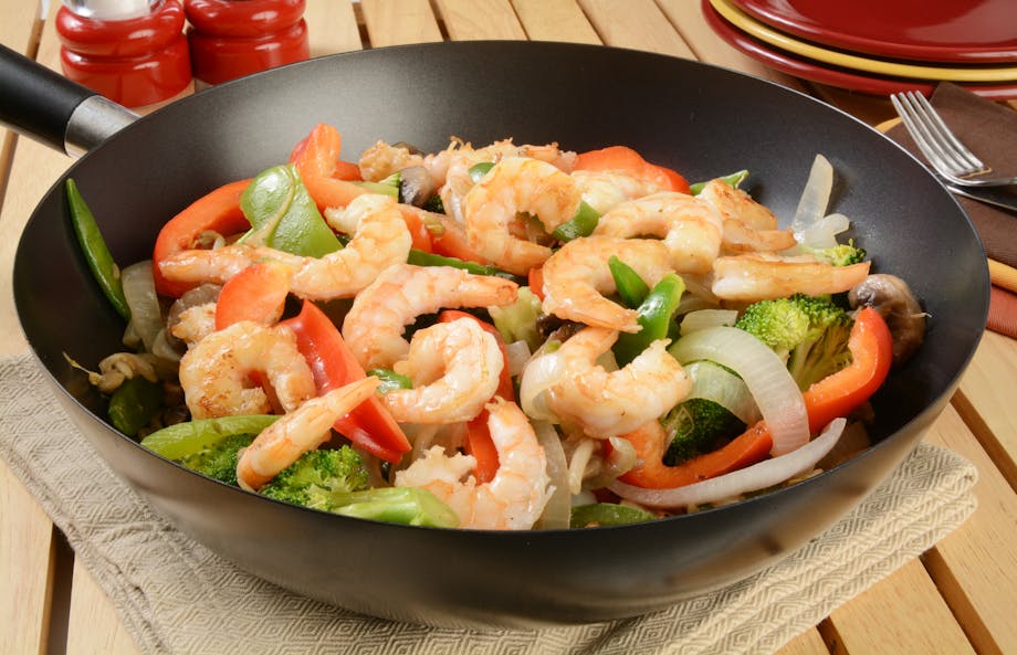 Shrimp stir fry in wok