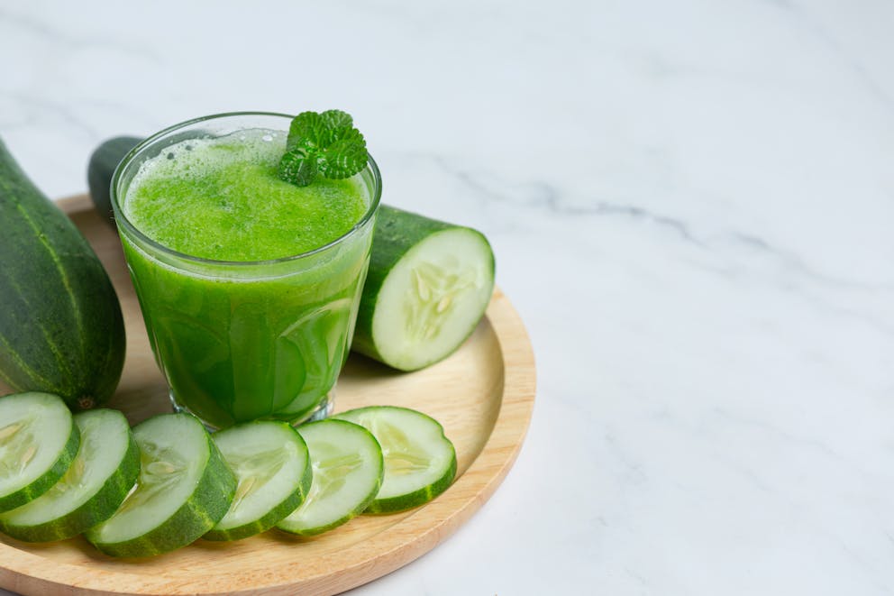 Cucumber juice and slices