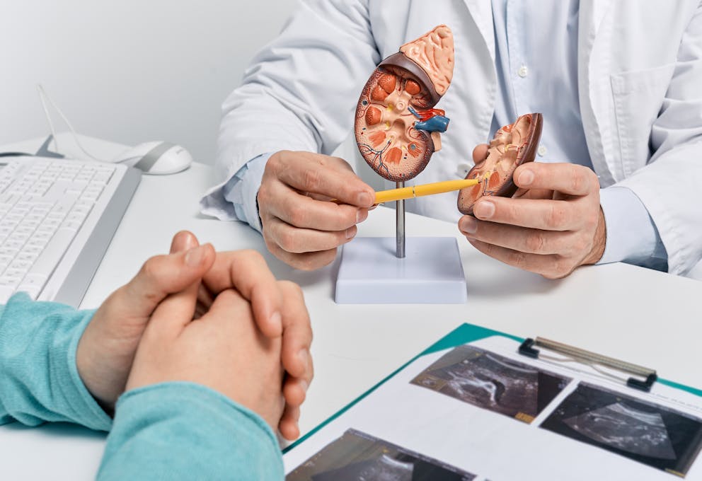 Doctor talking with patient