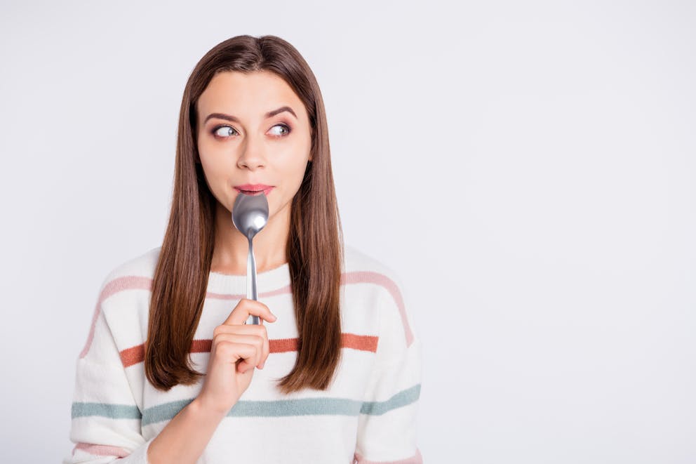 Woman thinking about eating