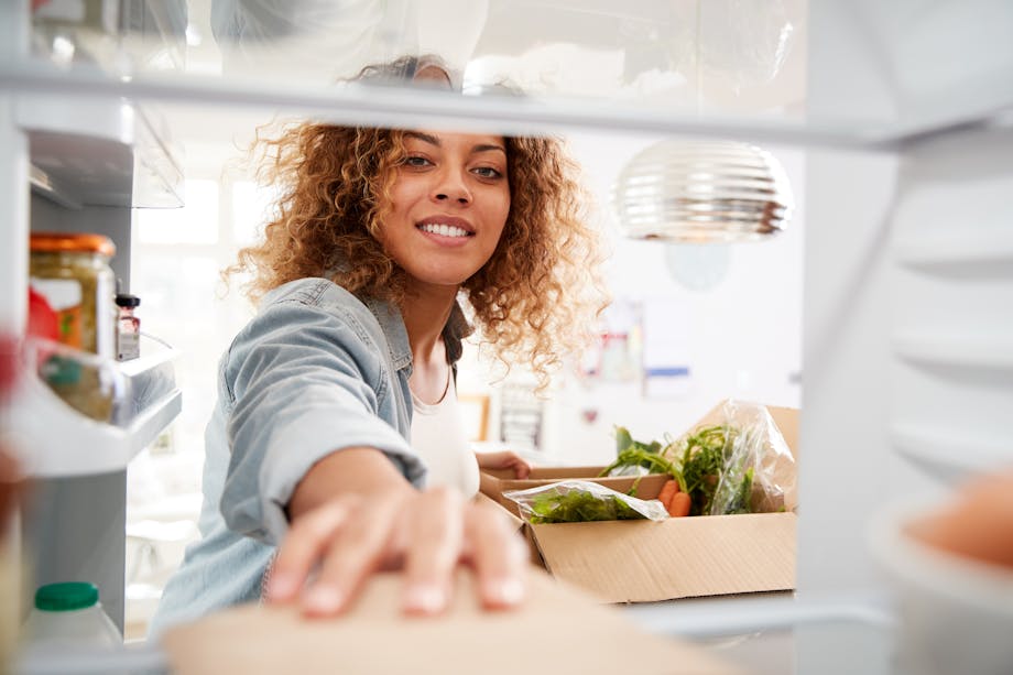 Placing food in the fridge