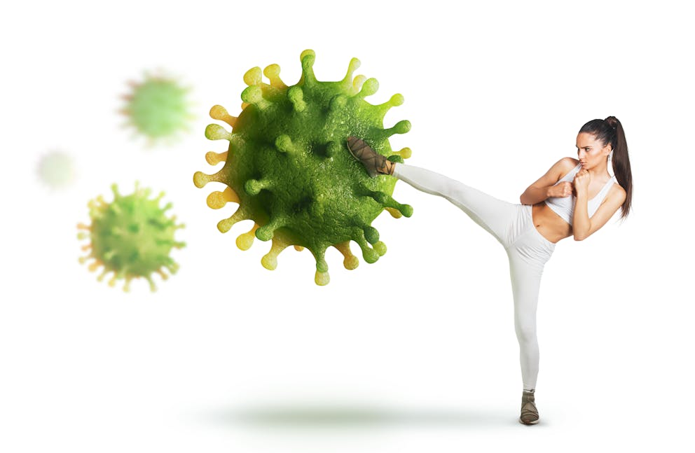 Woman kicking a virus illustration