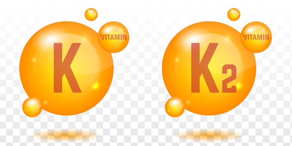 Vitamin K and K2 gold shining icons.
