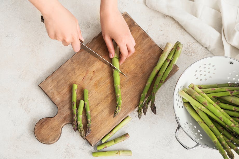 Cutting asparagus stalks