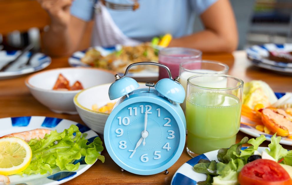 Clock in front of plates