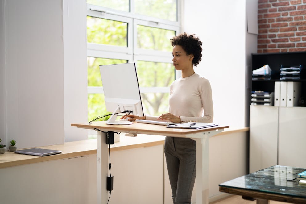 Woman using a stand-up desk