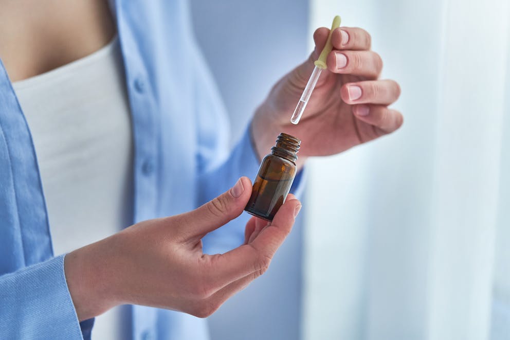 Woman using essential oil