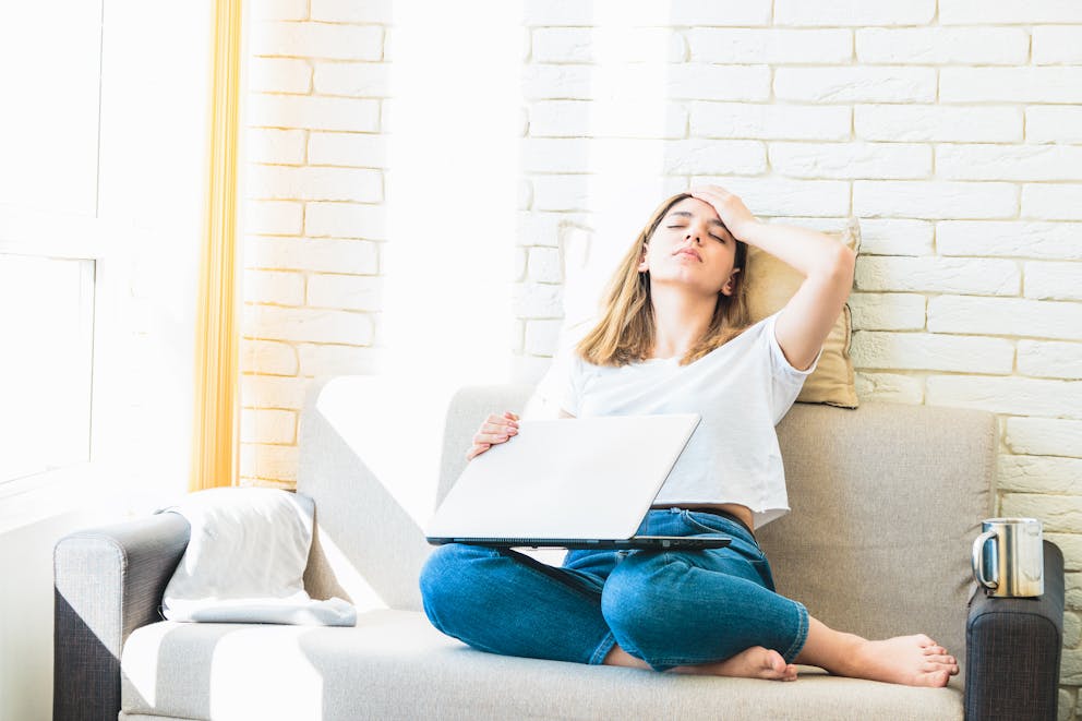 Woman getting tired while working