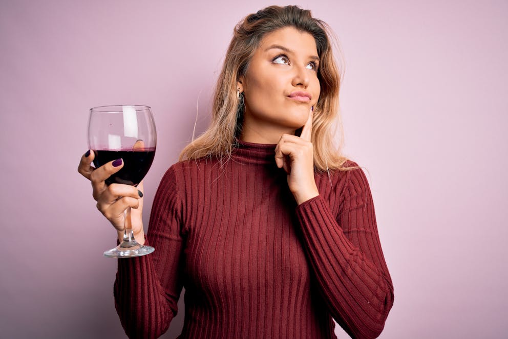 Women holding a glass of wine