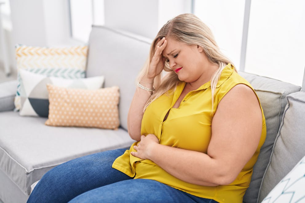 Woman with stomach pain